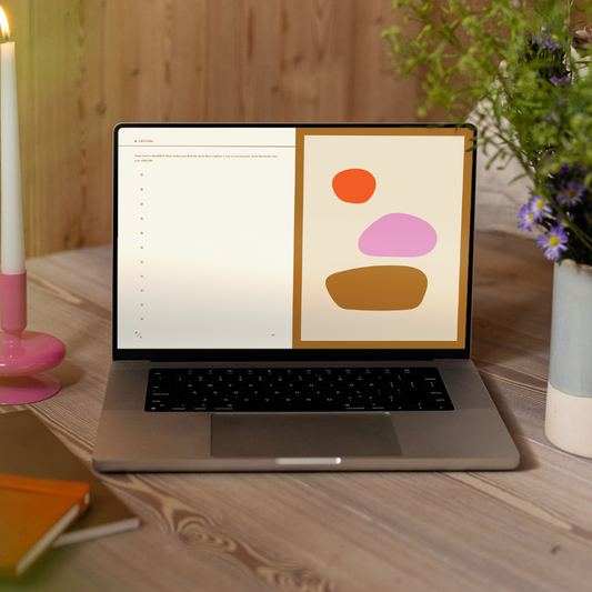 The Digital Me-est Me Journal displayed on a laptop screen. On the left side of the screen there is a prompt, on the right side of the screen there are 3 colorful shapes displayed as abstract art. 